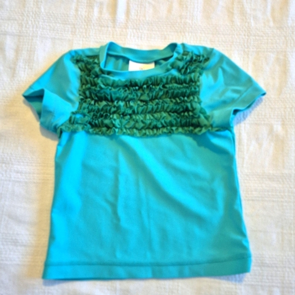 Hanna Andersson girls size 120 or 6-7 short sleeve ruffle front rash guard EUC